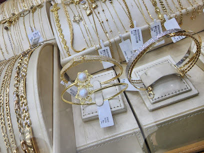 DIANA JEWELLERS - Doha - +974 4037 2581