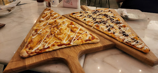 Slicy - Doha - +974 7774 5402